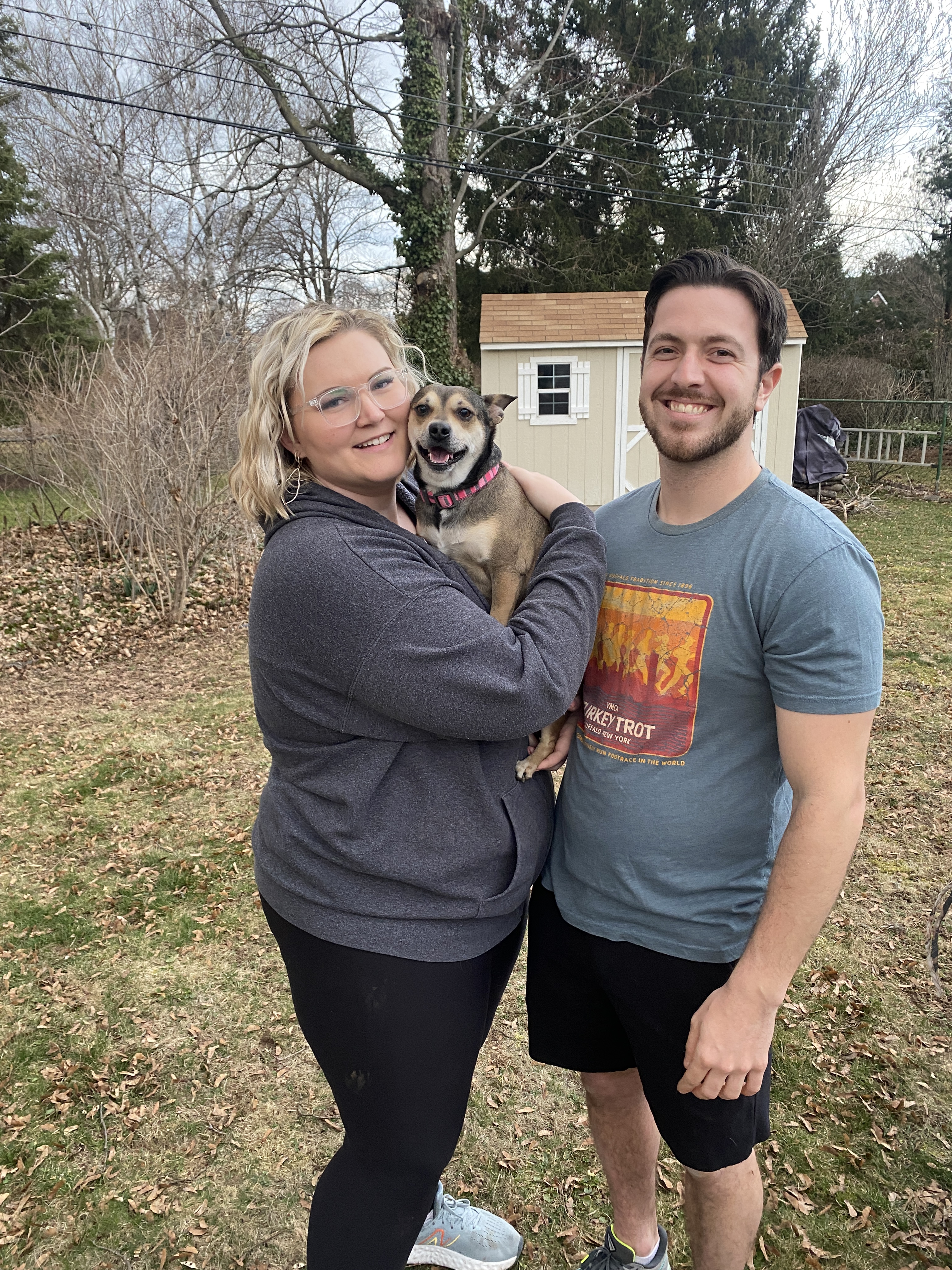 Photo of Samantha Rabatin, the owner of New Content Solutions, with her dog, Rosita, and her partner, David. 